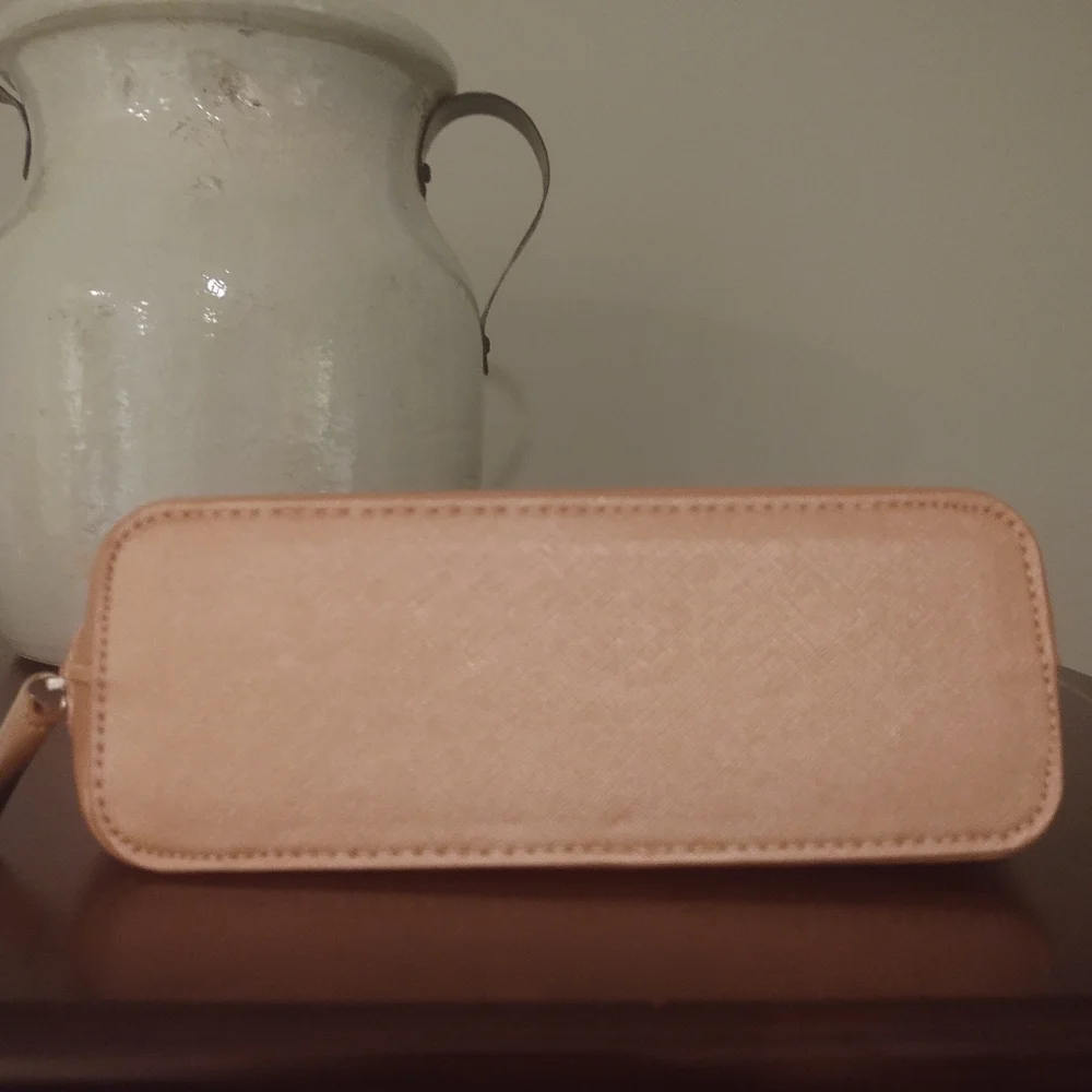 Young Living pink zipper